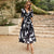 Casual Printed V-Neck Midi Dress with Puff Sleeves and Elastic Waist