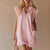Sleeveless Double Pocket Dress with Pockets and Ruffle Hem Detail