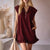 Sleeveless Double Pocket Dress with Pockets and Ruffle Hem Detail