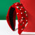 Festive Green and Red Headband for Holiday Celebrations