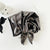 Retro-futuristic Bandana Headscarf with a Striking Metallic Texture