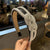 Sparkly Metallic Finish Women's Twisted Design Headbands
