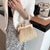 Elegant Hand-woven Wood and Pearl Handbags