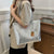 Chic and Roomy Metallic Crocodile-Texture Shopper Tote Bag