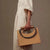 Women's Unique Metallic Top Handle Bag with Contrast Rope Straps