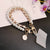 Women's Faux Pearl Chain Hanging Mobile Phone Wristlet