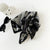 Retro-futuristic Bandana Headscarf with a Striking Metallic Texture