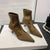 Fashion-forward Slip-On Boots with Pointed Toes and Slim Heels