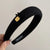 Textured Knitted Headbands with Small Black Bow and Gold-tone Charm