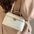 Simple Chic Textured Top Handle Handbag with Double-Zipper Closure