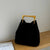 Women's Suede Bucket Bag with Elegant Gold-Toned Metal Handle