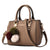 Elegant Handbag With Pompoms