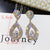 Exquisite and Opulent Long Drop Statement Earring Collection