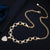 Glamorous Zircon Bejeweled Dangle Heart Charm Necklace and Bracelet Jewelry