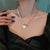 Luxurious Multi-Style Pearl Accented Chain with Heart Pendant Necklaces