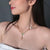 Multi-Chain Pearl and Lock Necklace