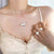 Multi-Chain Pearl and Lock Necklace