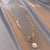 Multi-Style Luxurious Pearl Accented Chain with Heart Pendant Necklaces