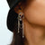Vintage-Inspired Portrait with Rhinestone and Pearl Chain Tassel Earrings